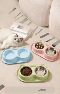 Gamelle double pour animaux avec design d'oreilles de chat et bols en acier inoxydable.