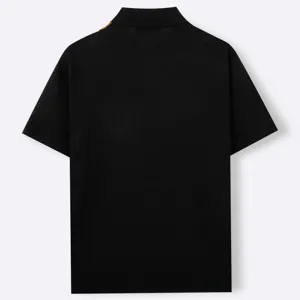 Mens short sleeve knit polo shirt in black with contrast shoulder stripe detail, back view.