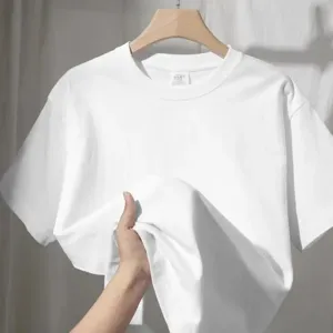 White cotton short sleeve t-shirt detail view, soft fabric texture display for men and women.