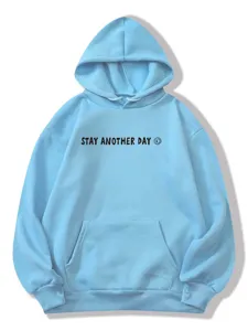 Detailed view of the light blue fleece hoodie featuring a chest graphic print and kangaroo pocket.