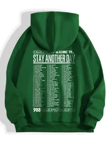 Dark green hoodie detail view showcasing chest graphic print and inspirational text design.