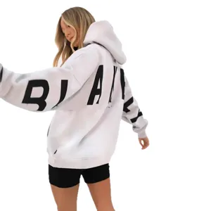 Oversized women's fleece hoodie with bold letter print, warm winter long sweatshirt for casual wear.