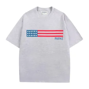 Grey cotton short sleeve t-shirt detail showing chest flag print and collar brand tag.