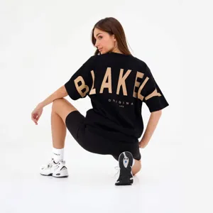 T-shirt casual manica corta ampia con stampa di lettere alla moda sul retro stile streetwear