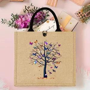 Durable jute tote bag featuring a beautiful butterfly tree print, perfect for shopping and travel.