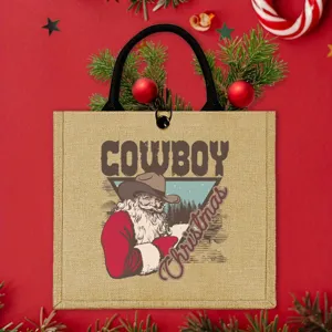 Detailed view of the Christmas cowboy Santa burlap tote bag with festive holiday print.