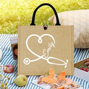 Custom jute tote bag with stethoscope and name design, perfect gift for nurses and medical students.