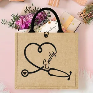 Custom nurse jute tote bag with stethoscope heart design and personalized name gift.