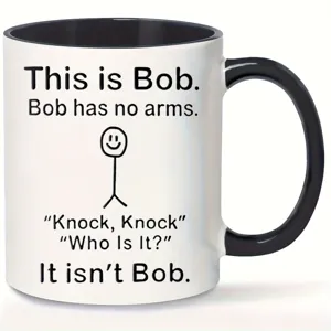 Closeup detail of 11oz ceramic coffee mug featuring funny stick figure text design.