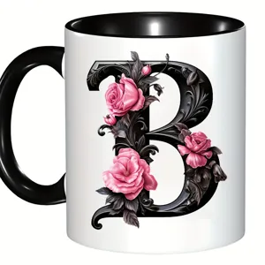 Tasse à café en céramique, design lettre B florale, poignée noire, vue détail cadeau.