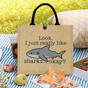 Jute tote bag with funny shark print, perfect for outdoor picnics, shopping and daily use.