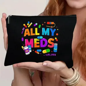 Schwarze Kosmetiktasche aus Segeltuch mit buntem Tabletten-Druck und sicherem Reißverschluss.