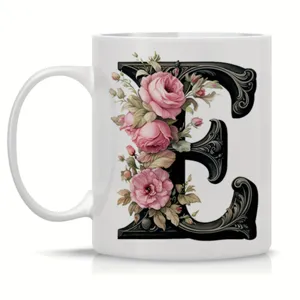 White ceramic coffee mug featuring an elegant vintage floral letter E monogram design for office use.