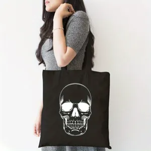 Schwarze Canvas-Tragetasche mit weißem Totenkopf-Motiv, ideal als Halloween-Geschenk und Shopper.