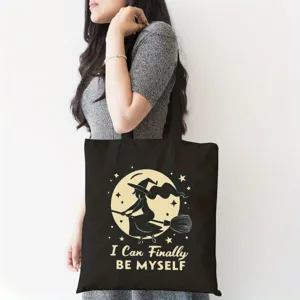 Schwarzer Canvas Tragbeutel mit Halloween Hexe Grafik und Spruch, langlebige Schultertasche.
