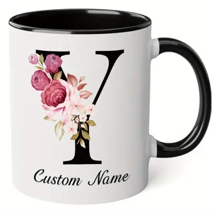 Custom floral letter ceramic coffee mug with black handle, perfect for office and daily use.