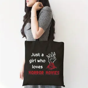 Schwarze Canvas Tragetasche mit Horrorfilm Print, lässige Umhängetasche für den täglichen Gebrauch.