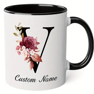 Custom letter V ceramic coffee mug with floral design, ideal for office and home use.