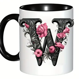 Tasse à café en céramique personnalisée avec un design floral élégant en W et poignée noire.