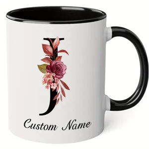 Detailed view of the custom letter J ceramic mug featuring elegant watercolor floral design elements.
