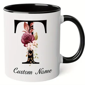 Ceramic coffee mug with letter T and floral design, custom name personalized gift for office and home use.