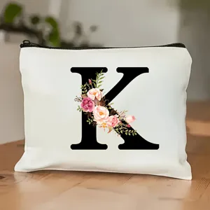 Moderne Kosmetiktasche aus Leinwand mit Buchstabe K und Blumenmuster für Reisen.