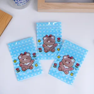 Sacchetti di stoccaggio con cerniera a quadri blu con simpatico orsetto per snack e caramelle