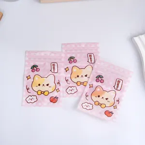 Simpatici sacchetti richiudibili a quadri rosa con stampa di cani per piccoli oggetti.
