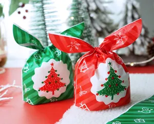 Christmas candy gift packaging bag detail view showing festive rabbit ear design with tree print.