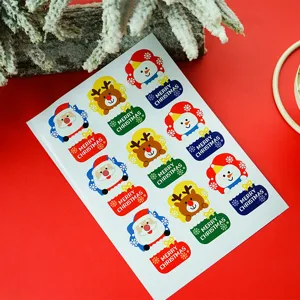 Kerst sticker detail met schattige ontwerpen van kerstman sneeuwman en rendier voor decoratie.