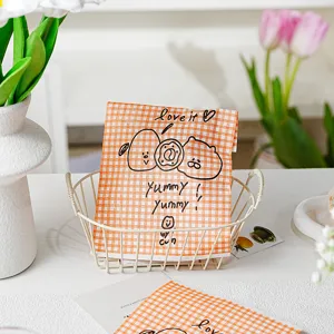 Minimalist cartoon greaseproof paper bag for baking, candy, and cookie packaging props.