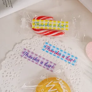 Long plaid journaling stickers with Thanks a lot text, perfect for DIY cookie and craft decor.