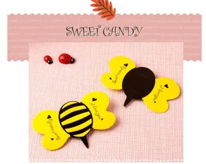 Lollipop decoration card detail, cute bee shape design, DIY paper packaging accessory.