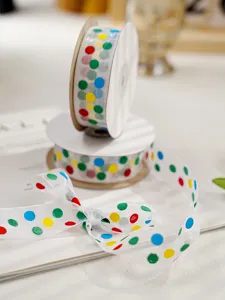 Colorful polka dot sheer ribbon detail for gift wrapping, floral packaging and birthday decor.