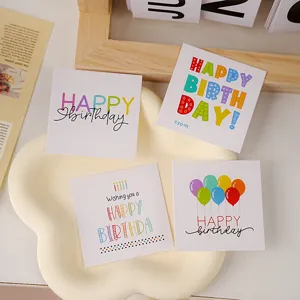 Mini birthday greeting cards featuring colorful typography and cute balloon illustrations.
