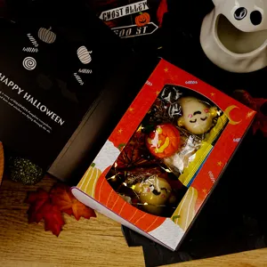 Halloween book shaped gift box packaging for cookies and candies, festive party favor box.