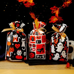 Halloween candy gift bags, cute cartoon drawstring plastic packaging bags for holiday treats detail view.