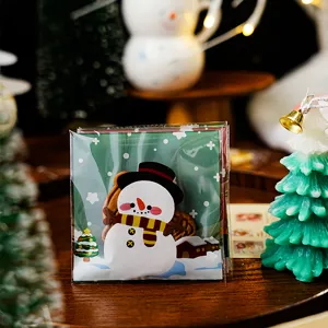 Christmas cookie packaging bag detail, cute snowman self-sealing opp pouch for holiday baking.
