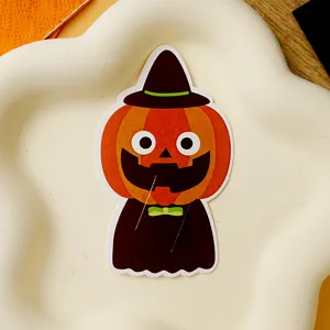 Carta di carta con inserto lecca-lecca fantasma di zucca di Halloween, dettaglio, decoro festa.