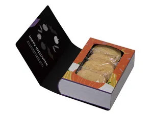 Detailed view of the Halloween book shaped gift box packaging with individually wrapped cookies inside.