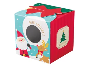 Vista detallada de la caja de regalo navideña con lazo rojo y motivos festivos.