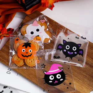 Αυτοκόλλητες σακούλες ζαχαρωτών Halloween με σχέδια κολοκύθας και φαντασμάτων.