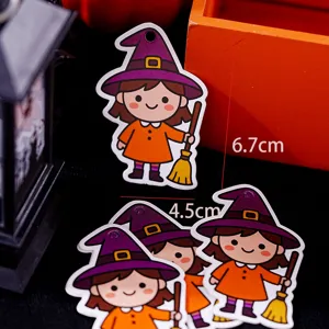 Detail view of cute Halloween witch paper hang tags with clear size markings for decoration.