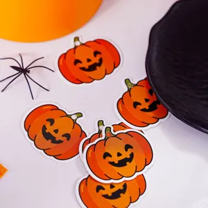 Detailed shot of Halloween pumpkin tags, ideal for DIY crafts, gift wrapping and party decor.