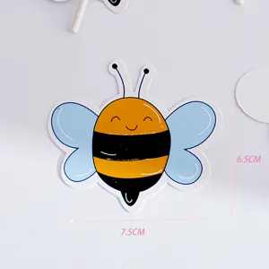 Cute cartoon bee paper card for candy packaging, party decoration, and DIY craft projects.