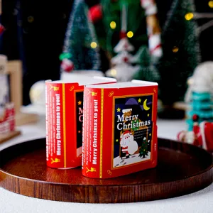 Weihnachtliches buchförmiges Papiergeschenkbox-Detail mit festlichem rotem Design für Kekse.