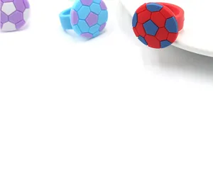 Detail shot of colorful silicone soccer rings, showing fine texture and vibrant candy colors.