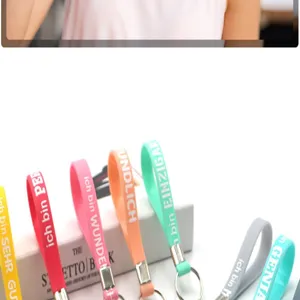 Braccialetto in silicone colorato con testo motivazionale, accessorio moda per studenti.