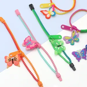 Bracelets zippés bicolores colorés avec de charmants pendentifs papillon, jouets anti-stress.