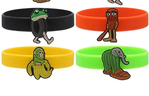 Close-up detail of colorful silicone wristbands featuring unique surreal cartoon animal charms.